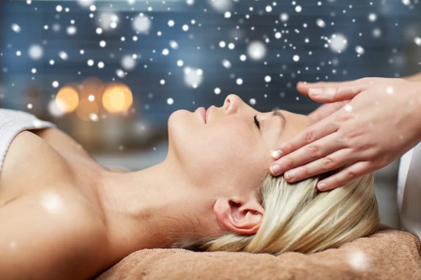 Close up of woman having face massage in spa salon — Stockfoto