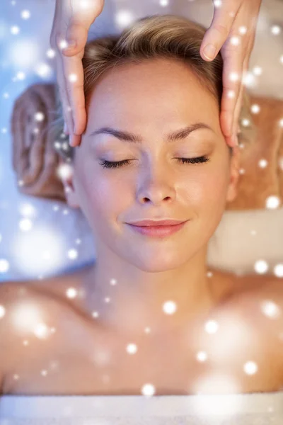 Close up of woman having face massage in spa salon — Stok fotoğraf