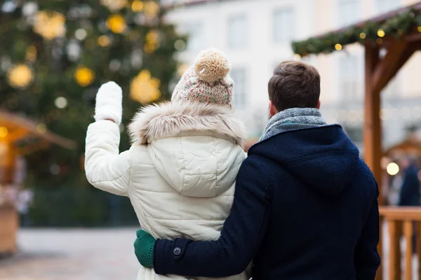 Close up of couple in old town at christmas — Stock Photo, Image