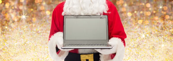 Perto de santa claus com laptop Fotografia De Stock