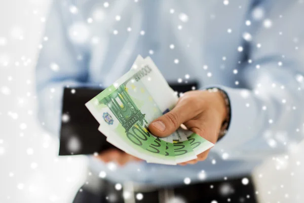 Close up of businessman hands holding money — Stock Photo, Image