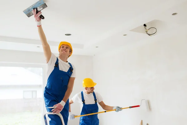 Group of builders with tools indoors — Stock Photo, Image