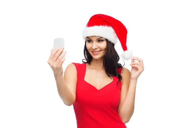 Femme en santa chapeau prendre selfie par smartphone — Photo