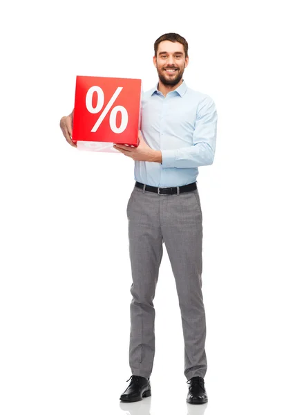 Glimlachende man met rode boodschappentas — Stockfoto