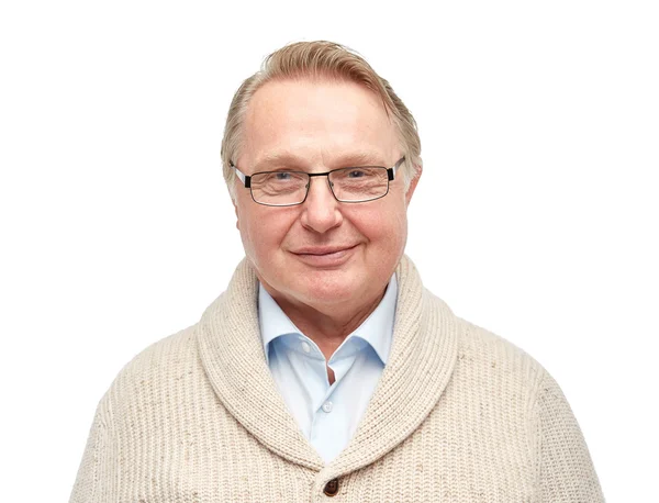 Smiling senior man in cardigan — Stock Photo, Image