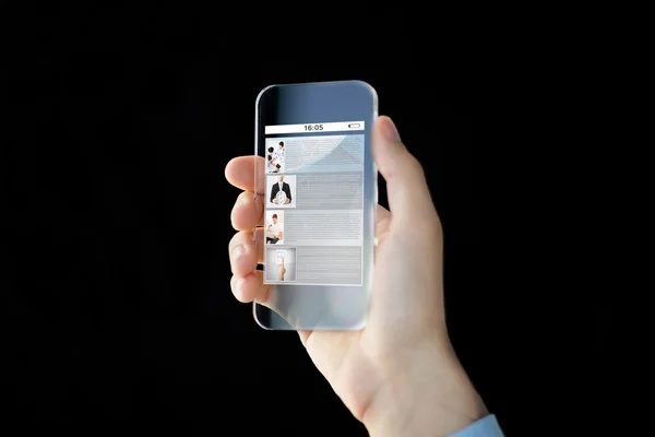 Primer plano de la mano masculina con smartphone transparente — Foto de Stock