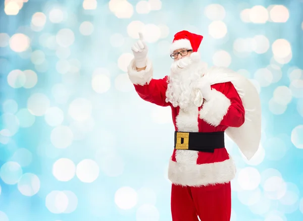 Muž v kostýmu santa Clause s taškou — Stock fotografie