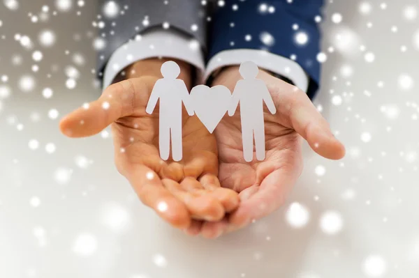 Close up of happy male gay couple with love symbol — Stock Photo, Image