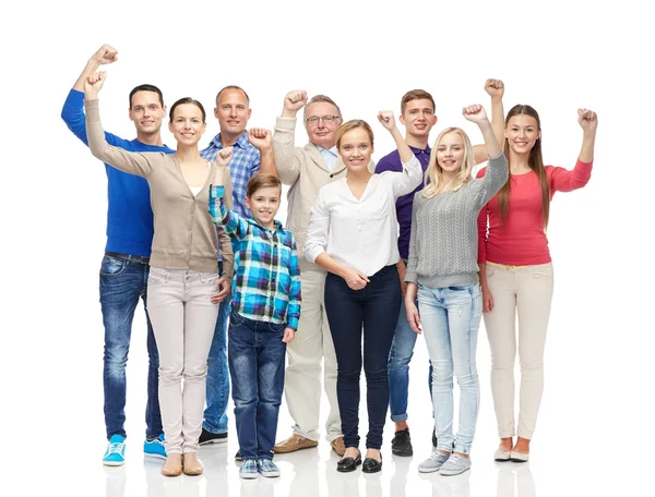 Grupo de personas felices mostrando puños — Foto de Stock