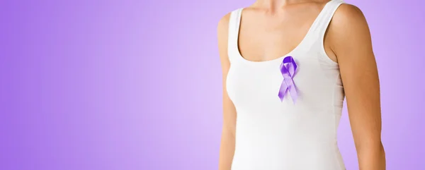 Close up of woman with purple awareness ribbon — Stok fotoğraf