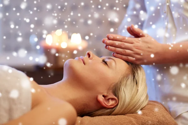 Close up of woman having face massage in spa salon — Stok fotoğraf