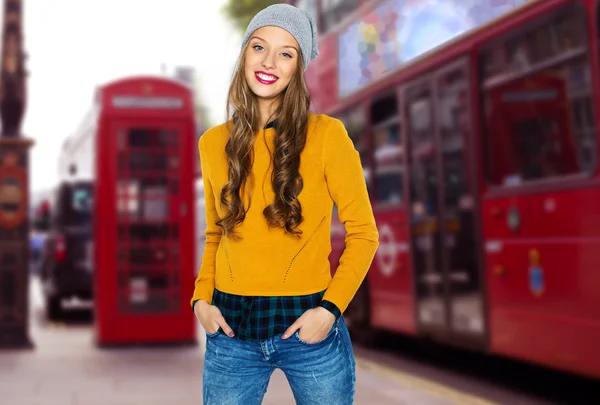 Happy young woman or teen over london city street — Zdjęcie stockowe