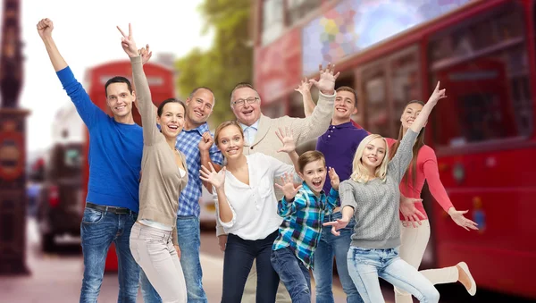 Group of happy people having fun over london city — Stockfoto