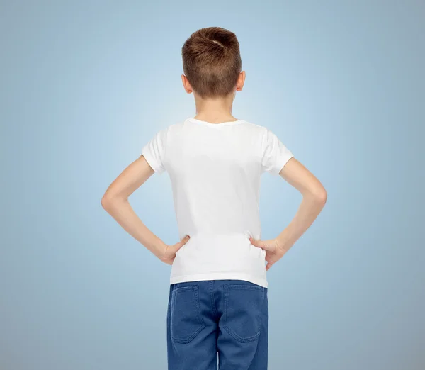 Boy in white t-shirt and jeans from back — Zdjęcie stockowe