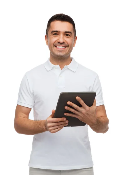 Smiling man with tablet pc computer Rechtenvrije Stockfoto's