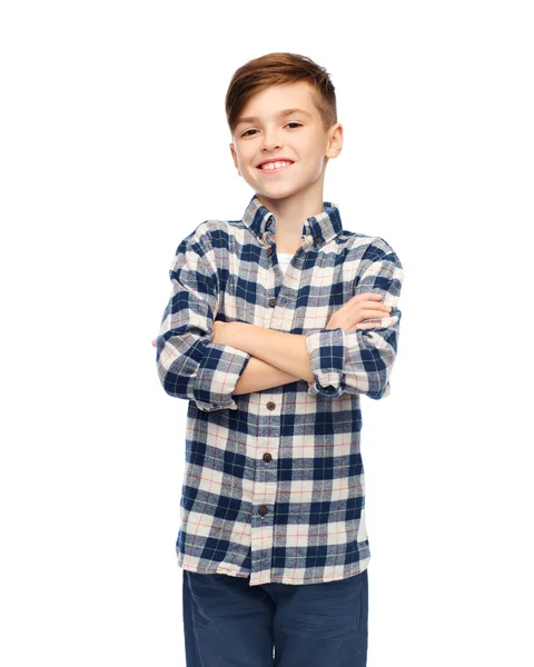 Menino sorridente em camisa xadrez e jeans — Fotografia de Stock