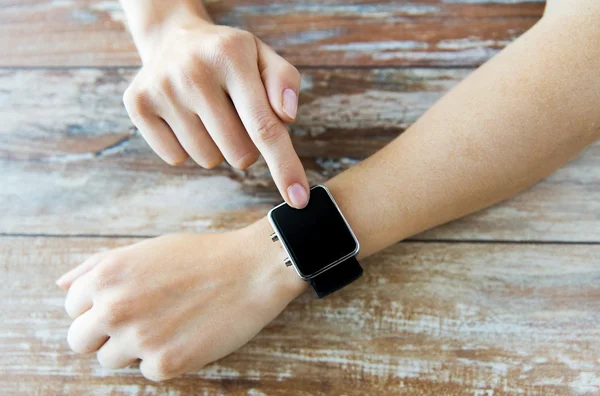 Close up of hands setting smart watch — Stock Photo, Image