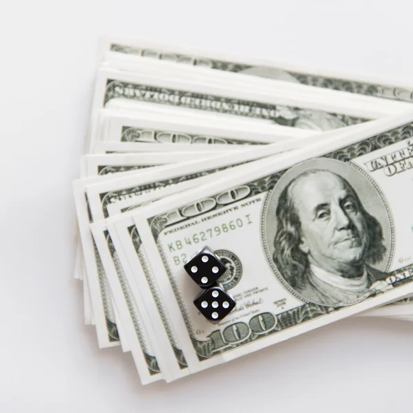 Close up of black dice and usa dollar money — Stockfoto