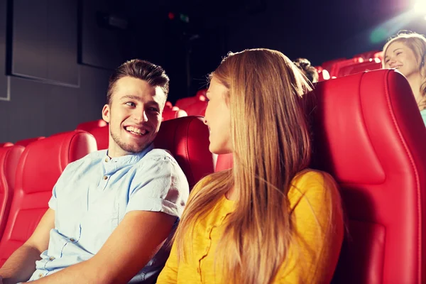 Happy friends watching movie in theater — Stock Photo, Image