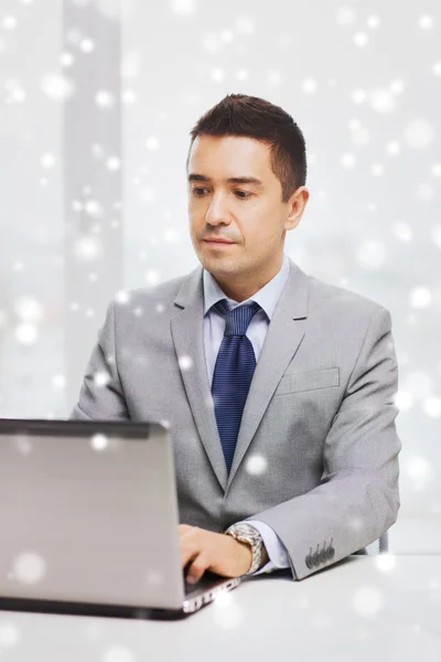 Businessman working with laptop in office — Stock Photo, Image