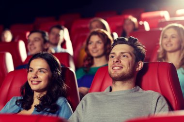 happy friends watching movie in theater clipart