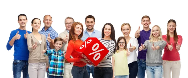 Feliz gente rojo porcentaje signo mostrando pulgares hacia arriba — Foto de Stock