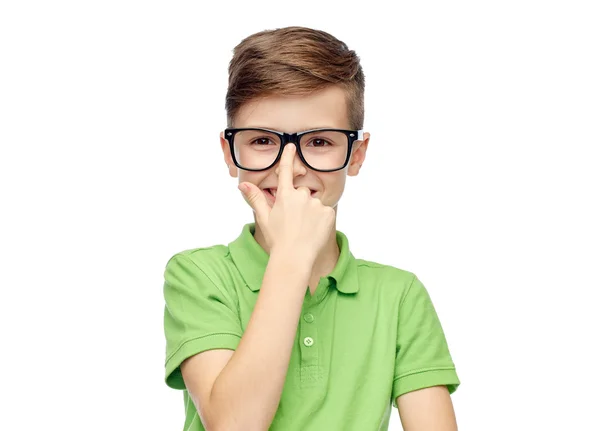 Happy boy in green polo t-shirt and eyeglasses — Stockfoto