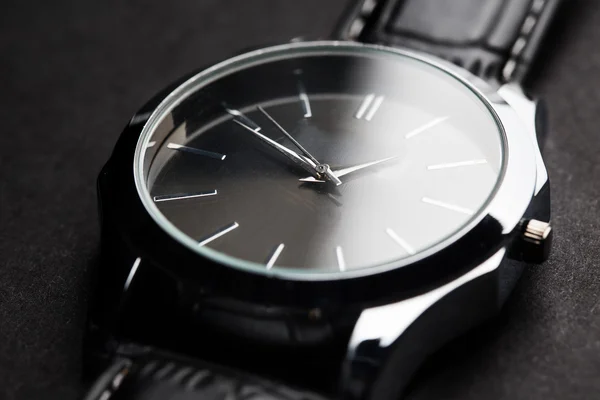 Close up of black classic male wristwatch — Stock Photo, Image