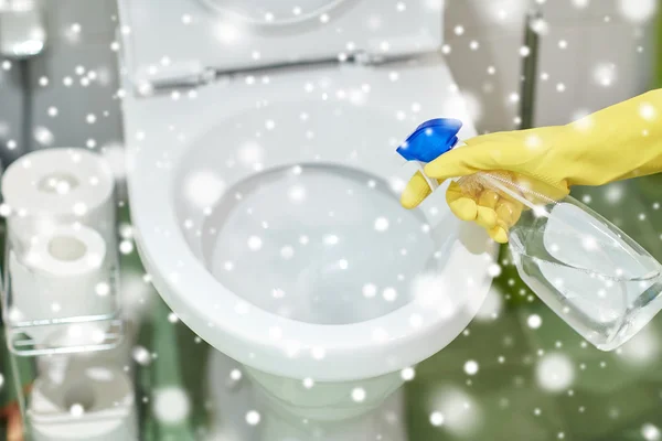 Close up of hand with detergent cleaning toilet — Stock Image Close up of hand with detergent cleaning toilet Royalty Free Stock Images