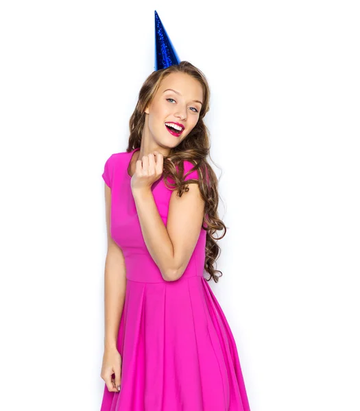 Gelukkig jong vrouw of tiener meisje in party cap — Stockfoto