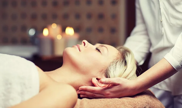 Close up of woman having face massage in spa — Stock Photo, Image