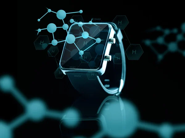 Close up of smart watch over hydrogen formulas — Zdjęcie stockowe