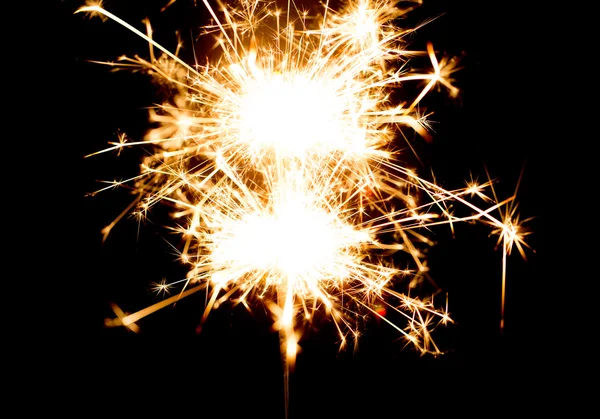 Sparkler or bengal light burning over black — Stock Photo, Image