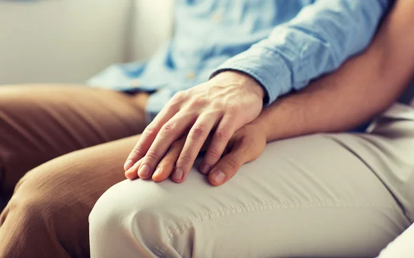 Close up of happy male gay couple holding hands — Stock Photo, Image