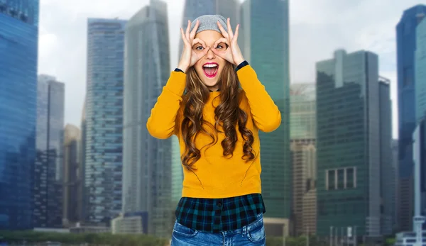 Happy young woman or teen having fun over city — ストック写真