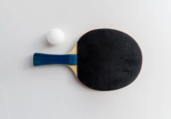 Close up of table tennis rackets with ball — Stock Photo, Image