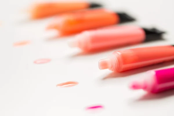 Close up of lip gloss tubes — Stock Photo, Image
