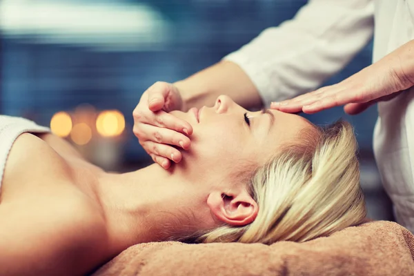 Close up of woman having face massage in spa — Stock Photo, Image