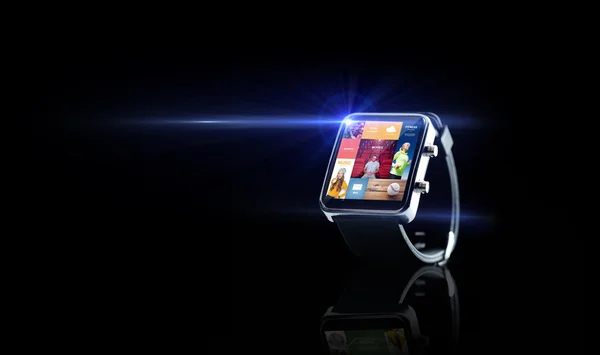 Close up of smart watch with media application — ストック写真