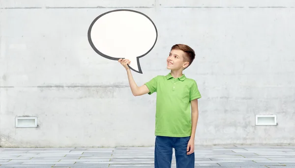 Happy boy holding blank white text bubble banner — Stock Photo, Image