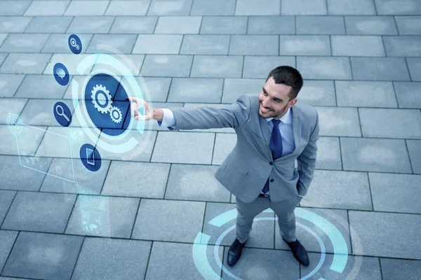 Young smiling businessman outdoors from top — Stock Photo, Image