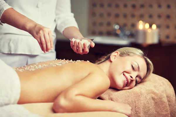 Close up of woman lying and having massage in spa — Stock Photo, Image