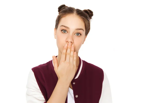 Confusa adolescente cubriendo su boca a mano — Foto de Stock