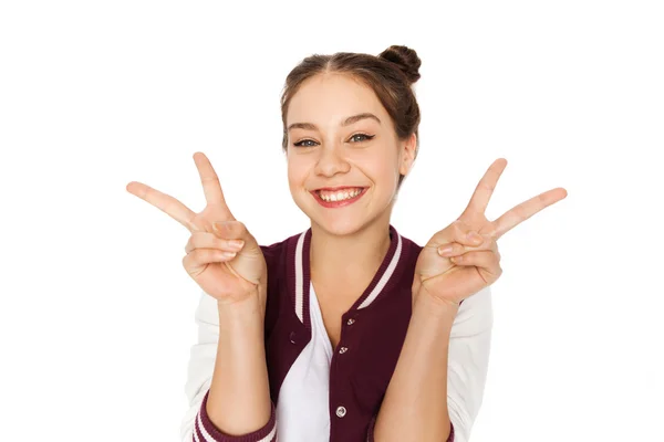 Boldog mosolygó tizenéves lány mutatja a béke jele Stock Fotó