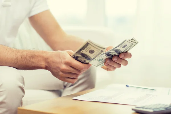 Close up of man hands counting money at home — Stock Photo, Image