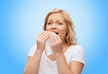 unhappy woman with paper napkin sneezing clipart