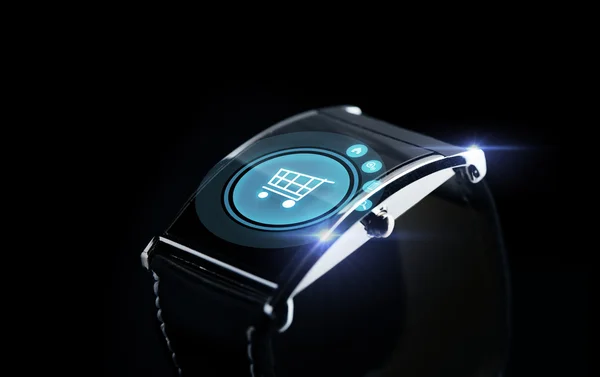 Close up of smartwatch with shopping cart icon — ストック写真