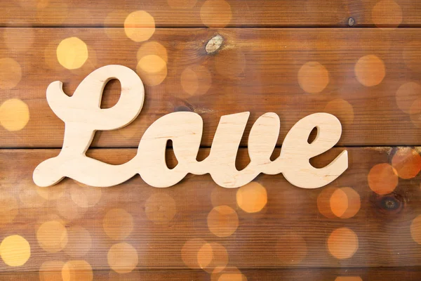 Close up of word love cutout on wood — Stock Photo, Image