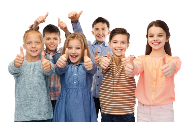 Happy children showing thumbs up Stock Picture