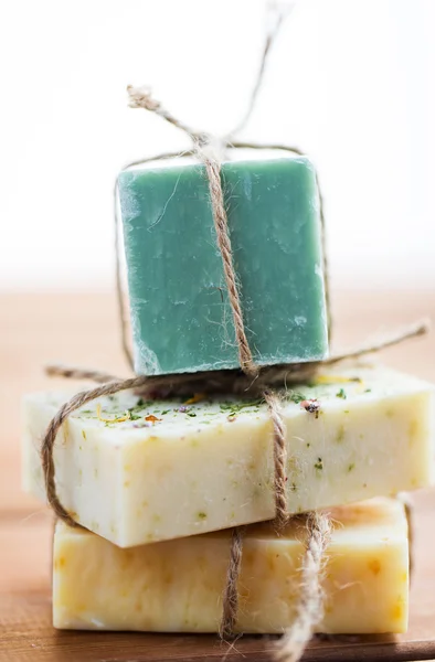 Close up of handmade soap bars on wood — Stock Photo, Image